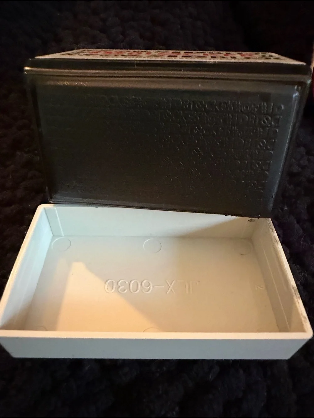 White and Black IDBLOCKER Stamp with Red Logo